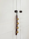 sleigh bells - leather/brass - evergreen by millstream home