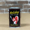 Holiday Fried Pecans tin with red squirrel illustration on a wood tabletop