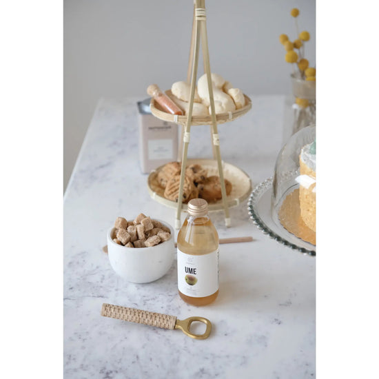 bottle opener - wrapped bamboo + brass by creative co-op