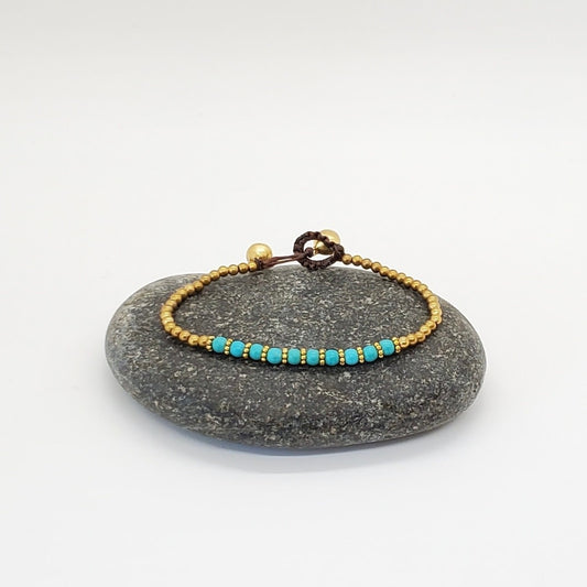 bracelet - brass + stone center turquoise by baizaar