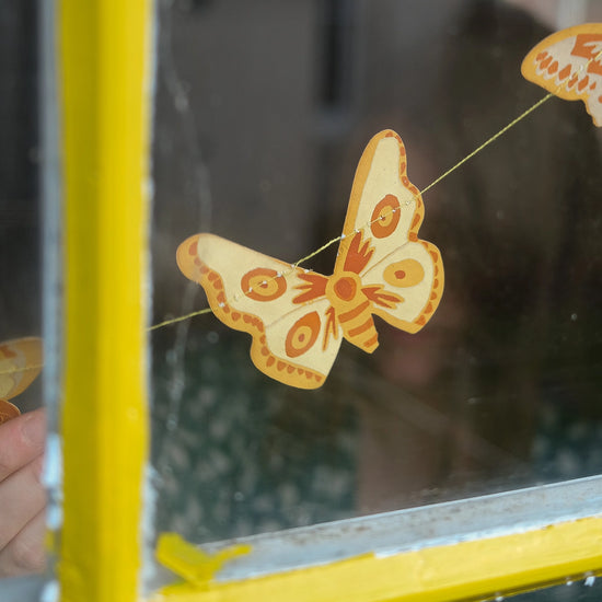 garland - recycled cotton paper - butterflies yellow/ochre/white by east end press