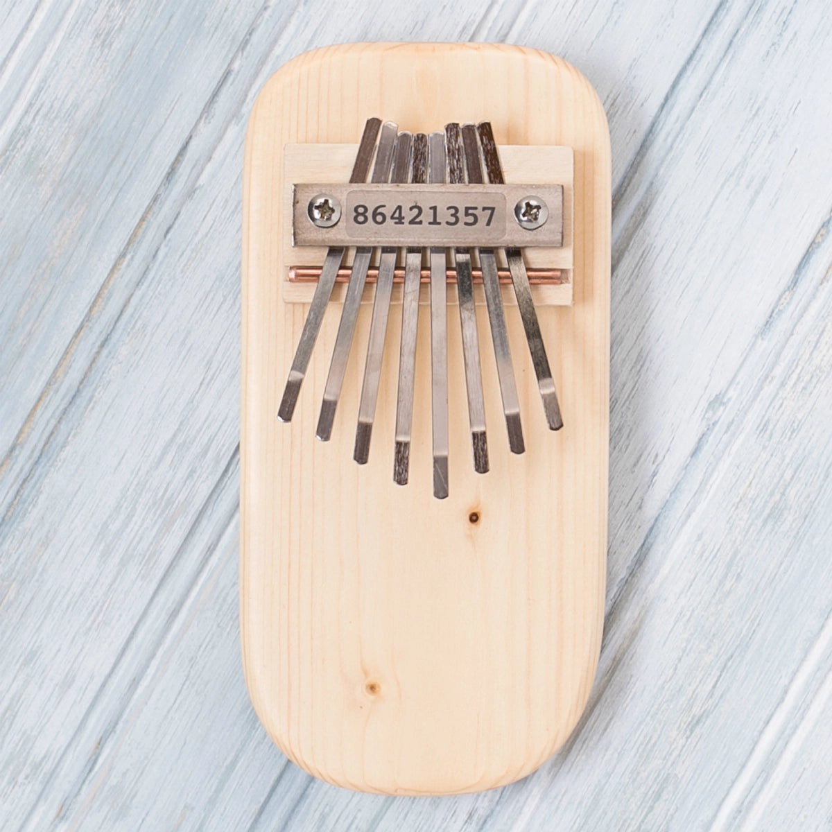 thumb piano - color by mountain melodies, llc