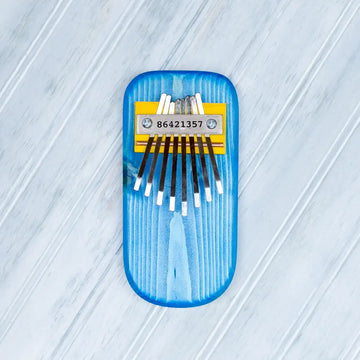 thumb piano - color by mountain melodies, llc