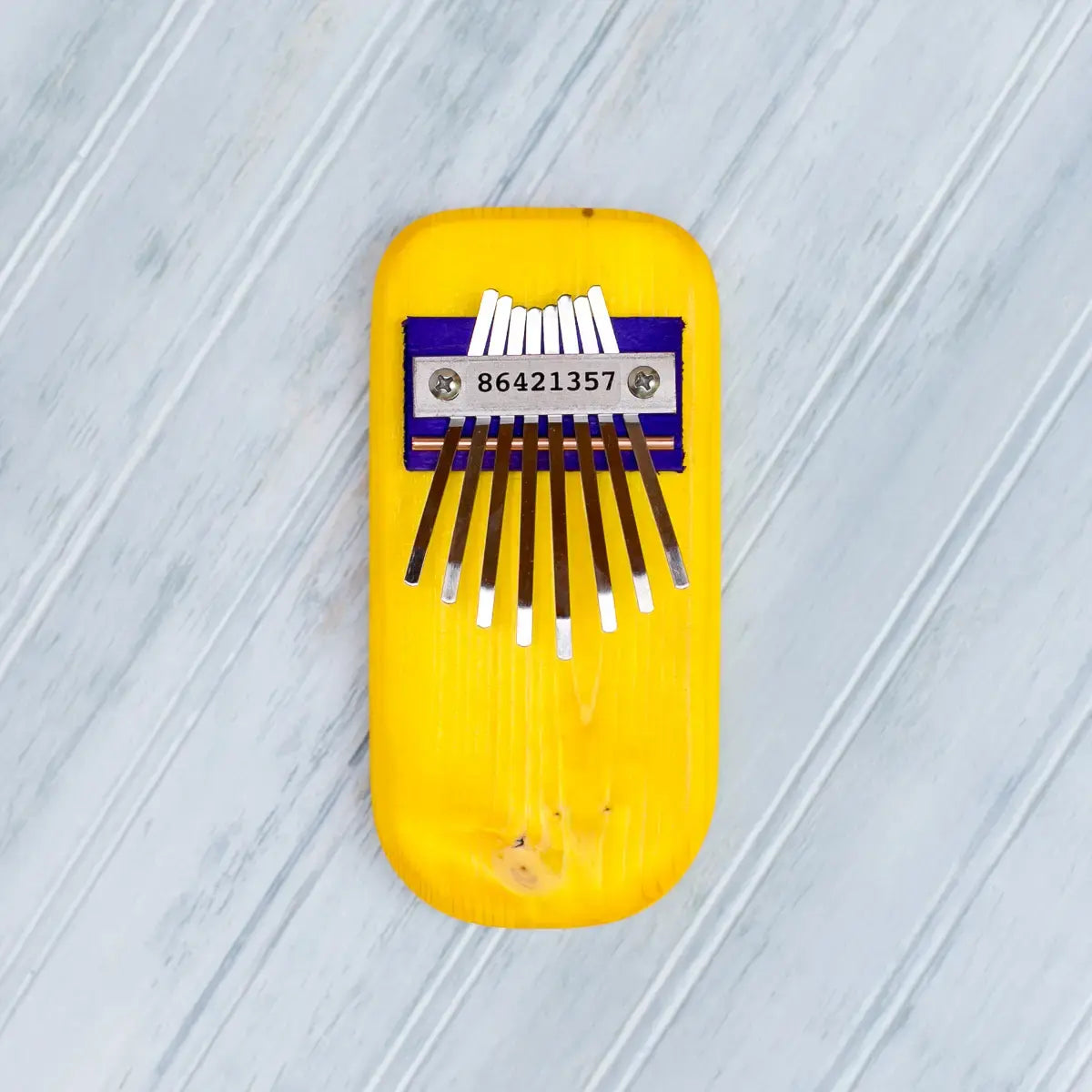 thumb piano - color by mountain melodies, llc