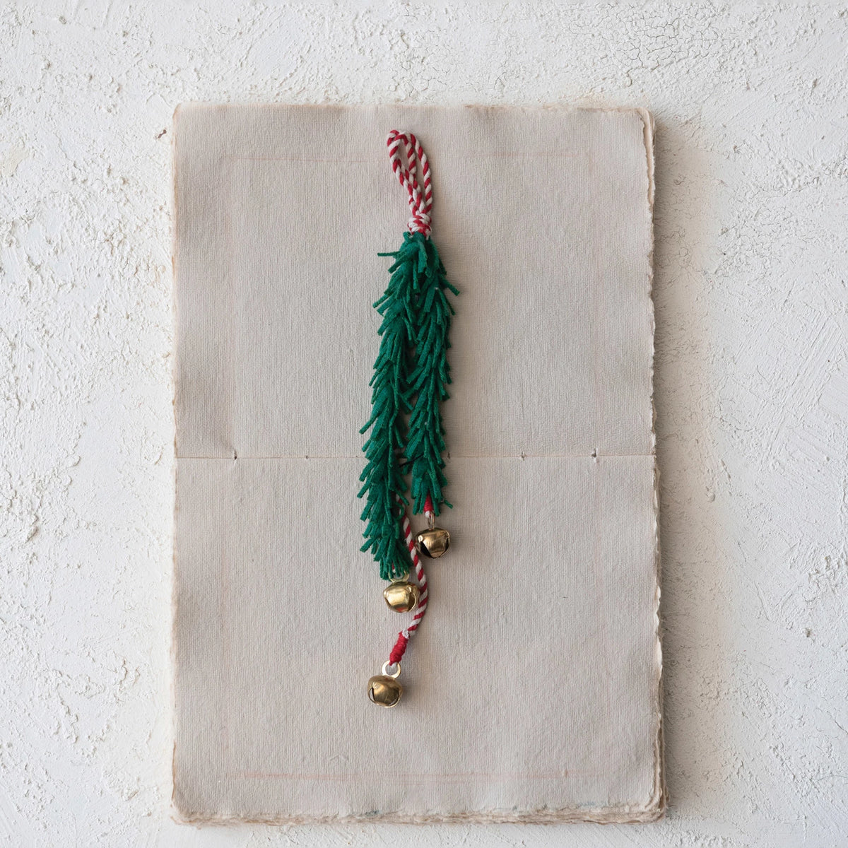 door hanger - felt thin leaves + jingle bells by creative co-op