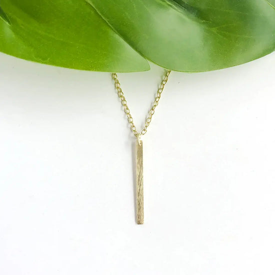necklace - dangling bar pendant - gold by worldfinds