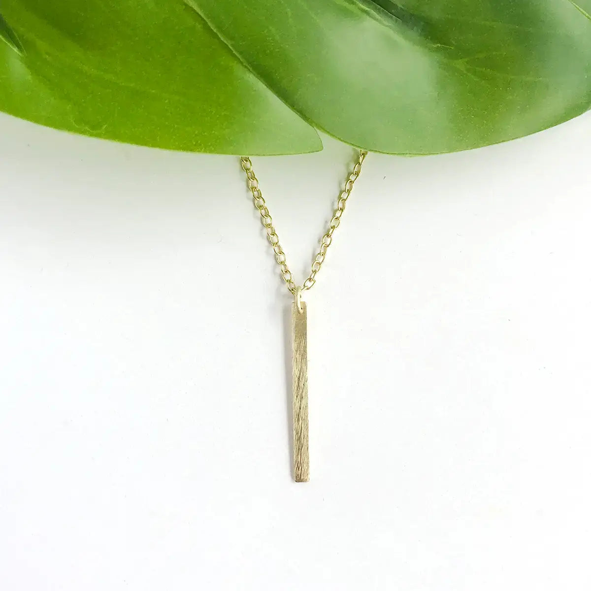 necklace - dangling bar pendant - gold by worldfinds