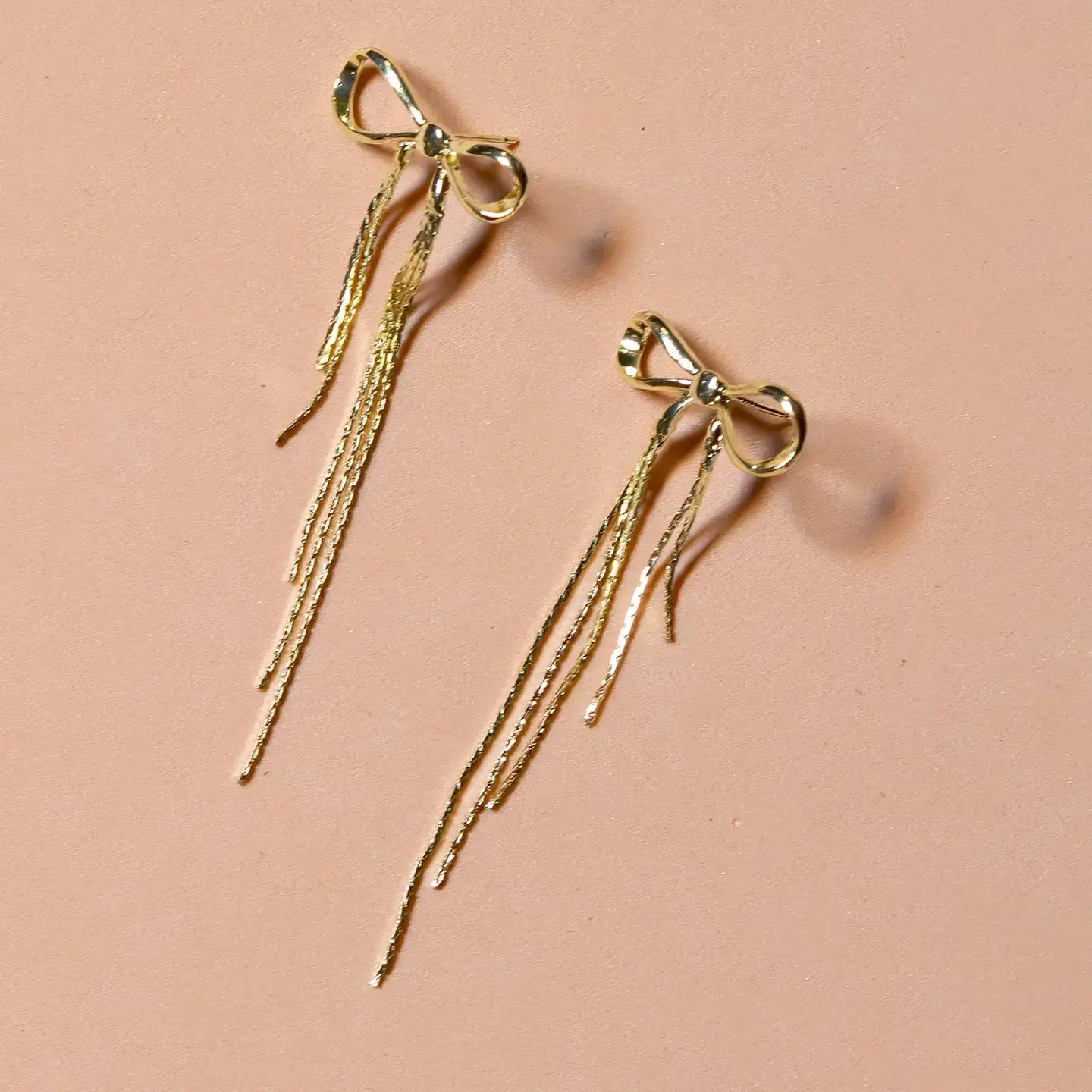 earrings - disco bow dangle stud - 18kgp by peter and june