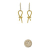 earrings - brass knotted by brass sand