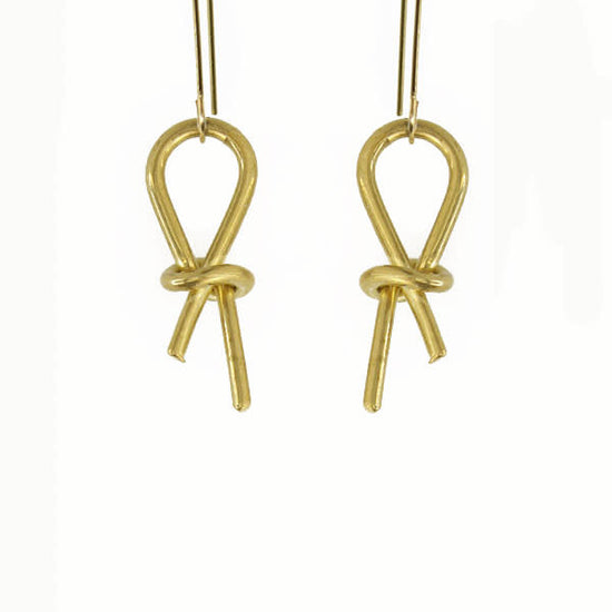 earrings - brass knotted by brass sand