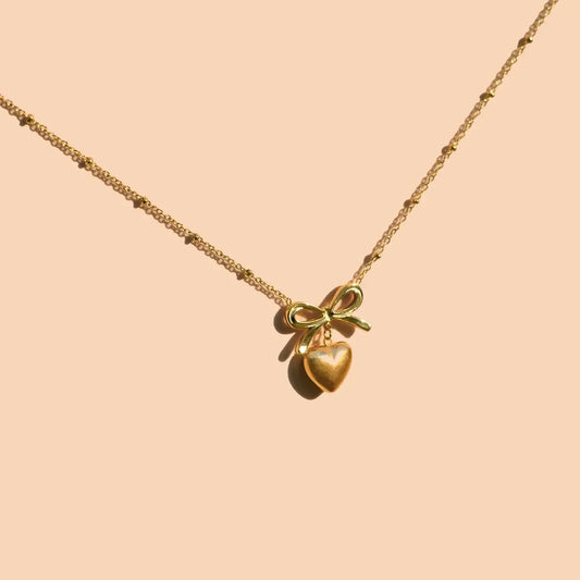 necklace - effie heart + bow - 18kgp by peter and june