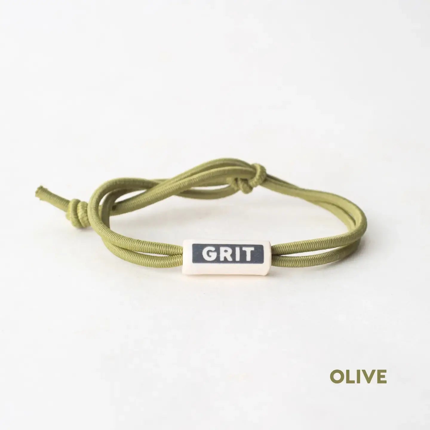 bracelet - stretch cord - ceramic tag by mudlove