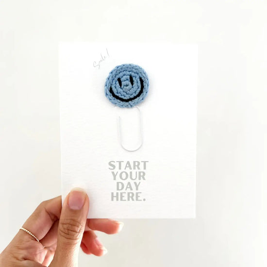 bookmark - paperclip - happy face by impactful market