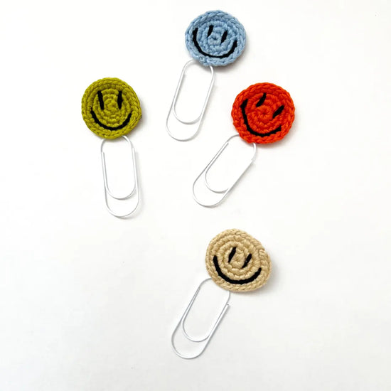 bookmark - paperclip - happy face by impactful market