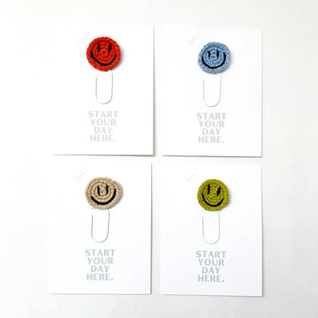 bookmark - paperclip - happy face by impactful market
