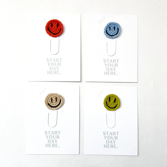 bookmark - paperclip - happy face by impactful market