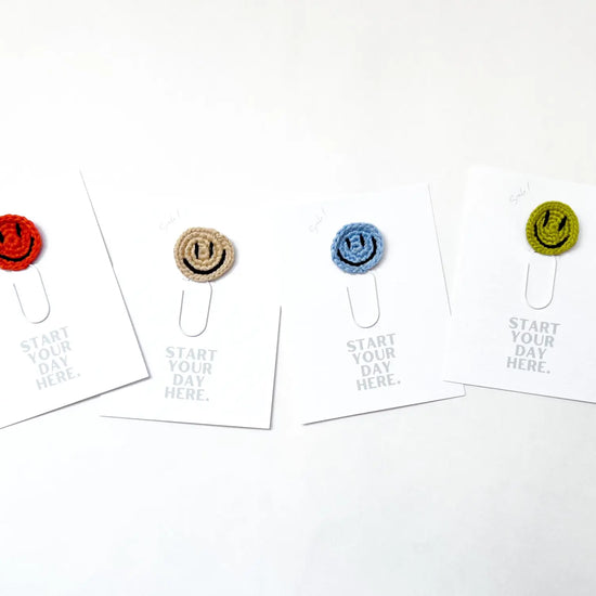 bookmark - paperclip - happy face by impactful market