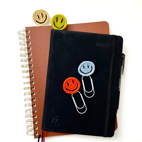 bookmark - paperclip - happy face by impactful market