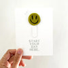 bookmark - paperclip - happy face by impactful market