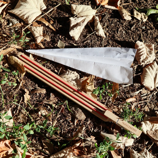toy - paper plane launcher by kikkerland