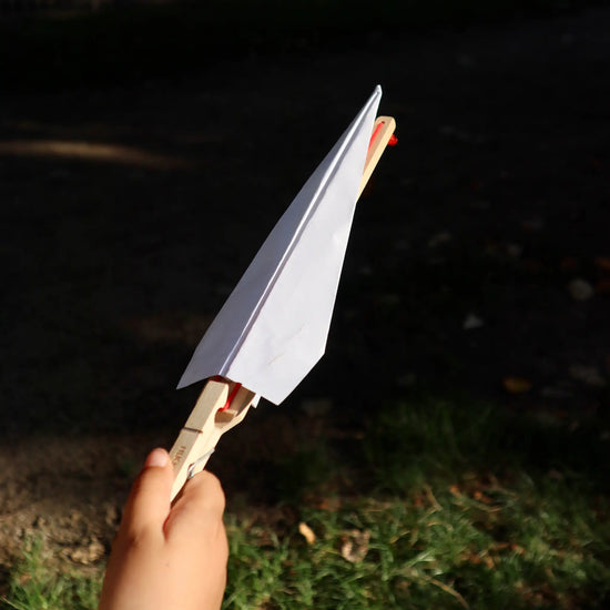 toy - paper plane launcher by kikkerland