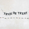 banner - "trick or treat" - black paper by creative co-op