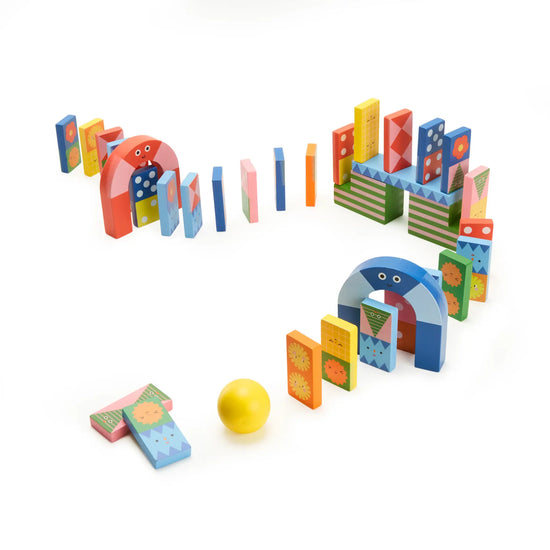 game - dominoes - topple twist by kikkerland