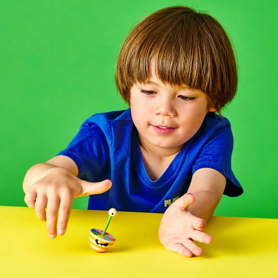 toy - monster spinning top by kikkerland