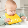 baby silicone starter bib - "little bites" by bella tunno