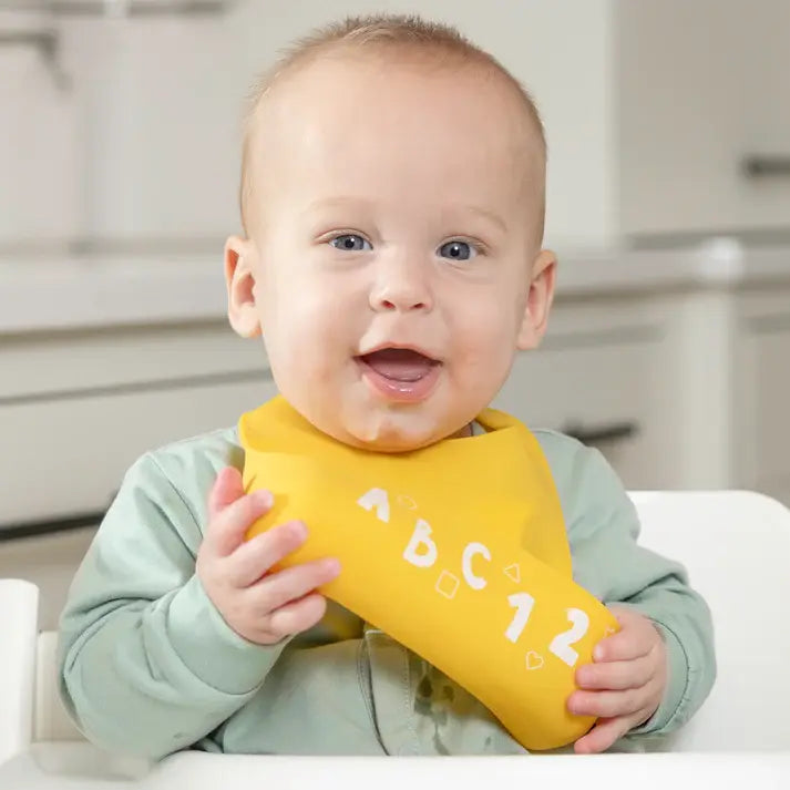 baby silicone starter bib - "little bites" by bella tunno