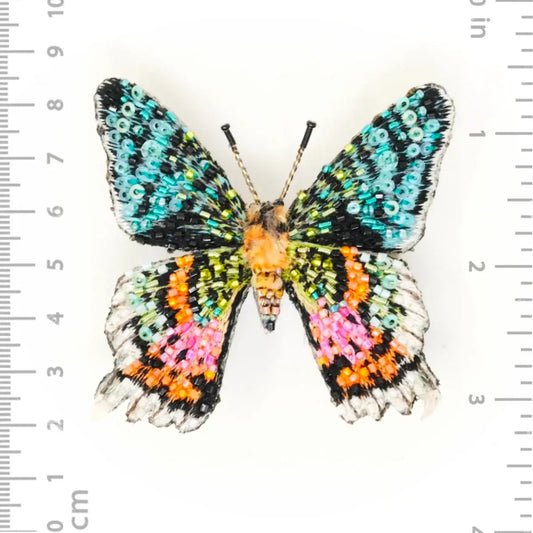 brooch pin - madagascar sunset moth by trovelore