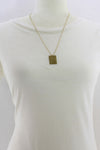 necklace - brass plaque - "one inch" by brass sand