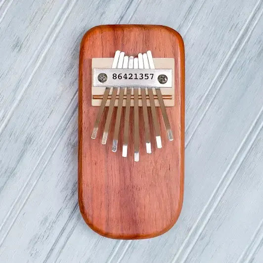 thumb piano - padauk wood by mountain melodies, llc