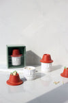 candle + match striker - red hat + beard - balsam fir by paddywax
