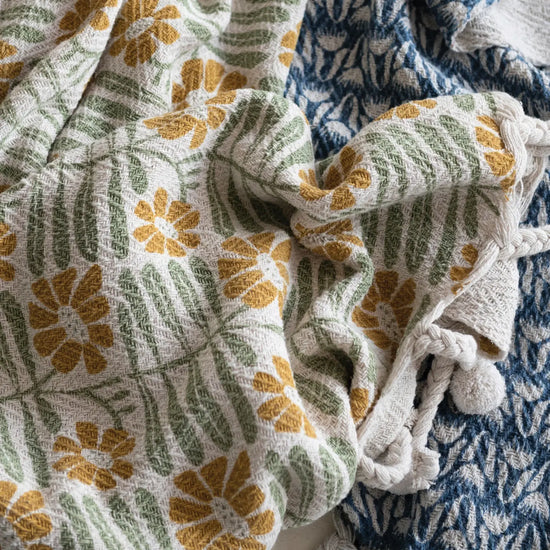 throw blanket - flowers + braided poms by creative co-op
