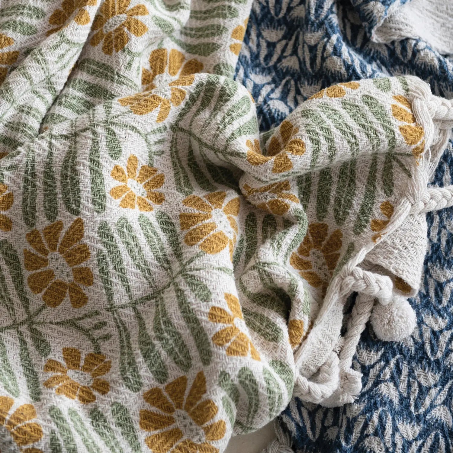 throw blanket - flowers + braided poms by creative co-op