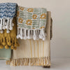 throw blanket - flowers + braided poms by creative co-op