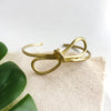 bracelet - sculptural bow cuff - gold by worldfinds