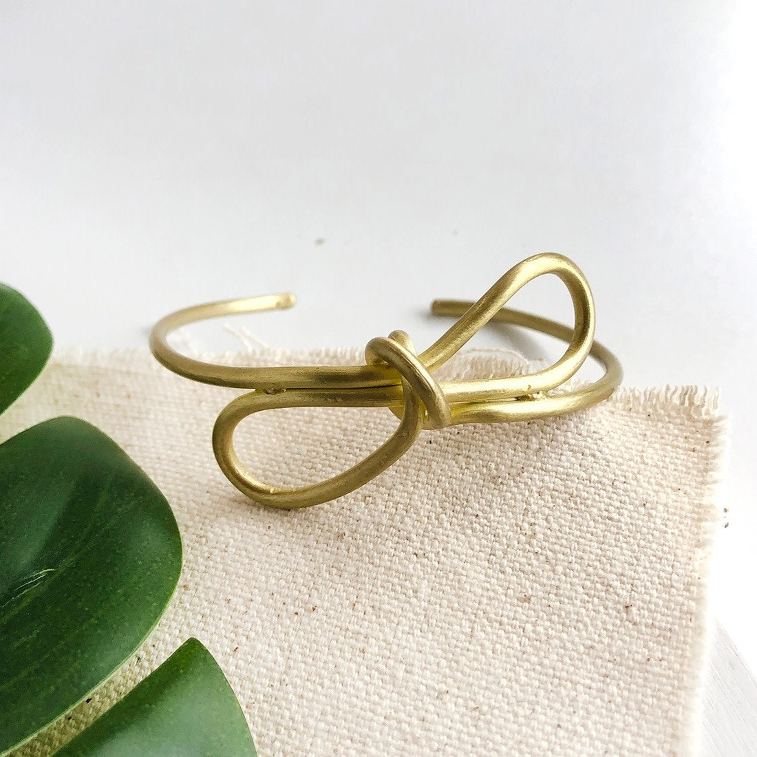 bracelet - sculptural bow cuff - gold by worldfinds