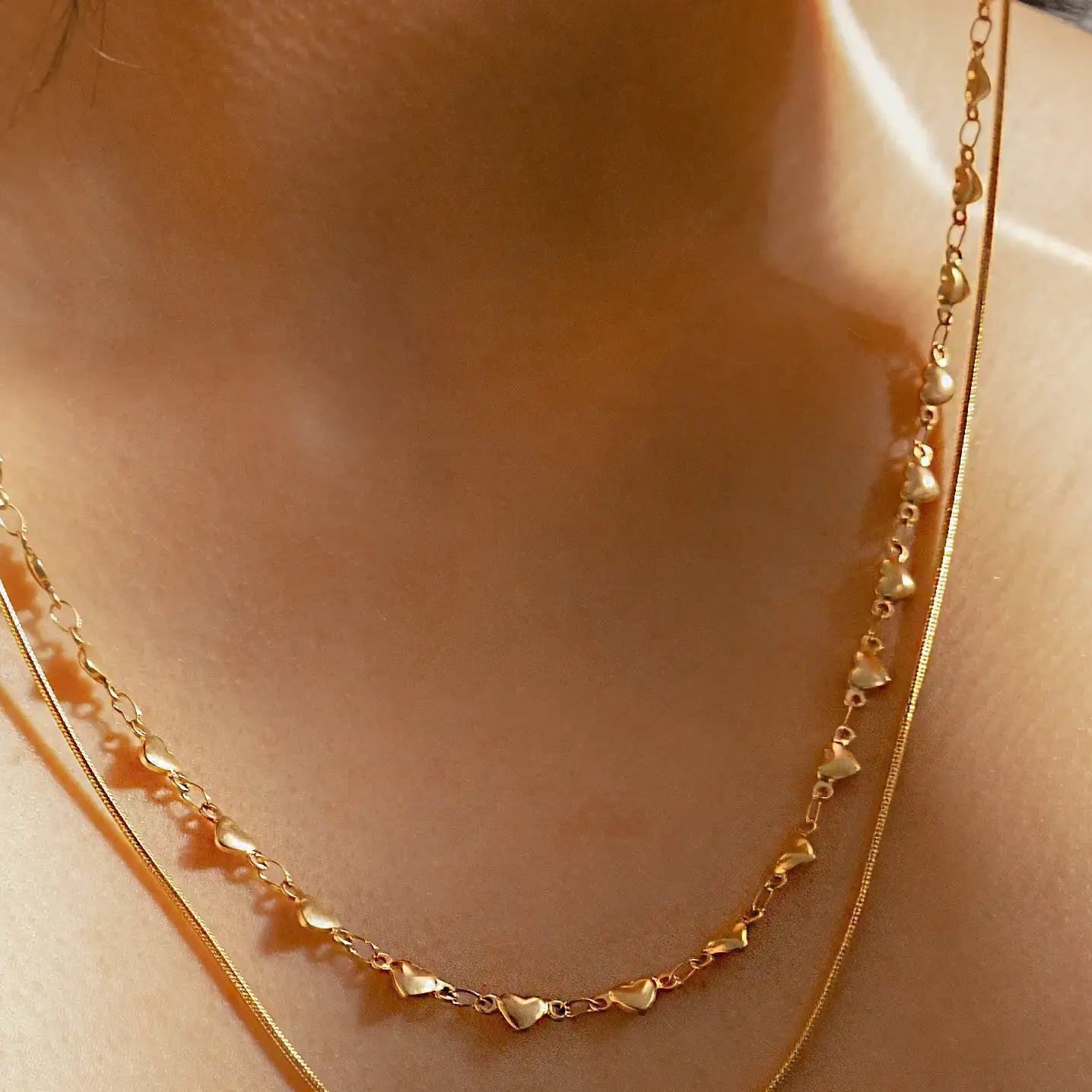 necklace - 2-strand string along hearts - 18kgp by peter and june