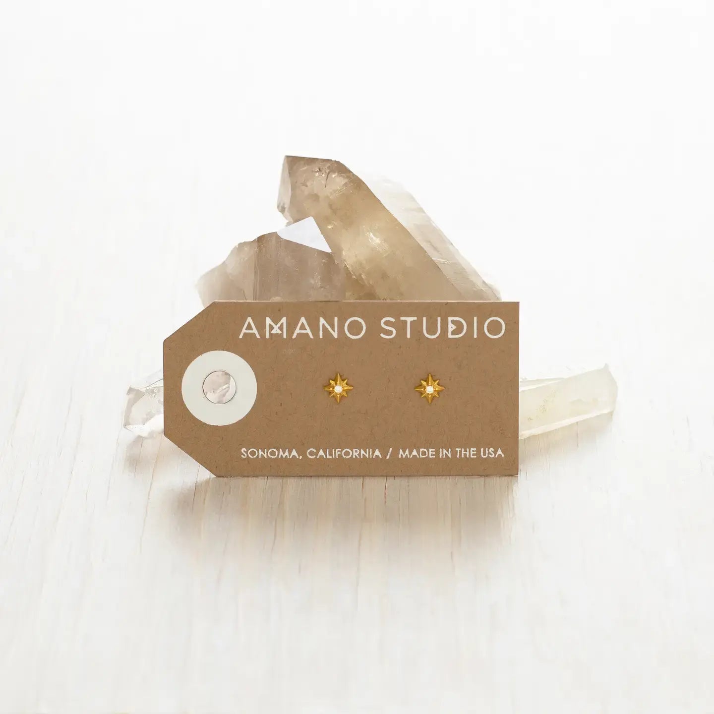 earrings - stud - tiny venus star - 14kgp by amano studio