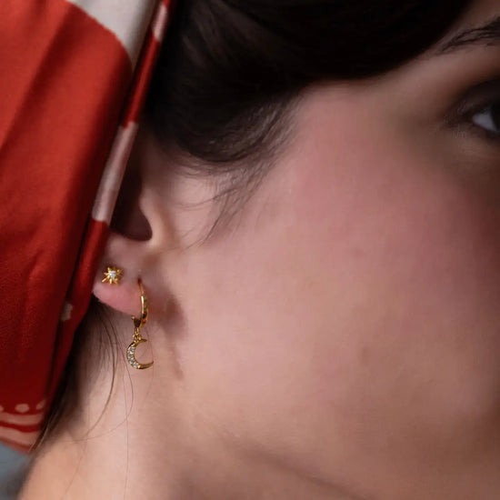 earrings - stud - tiny venus star - 14kgp by amano studio