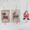ornament - pulling santa by creative co-op
